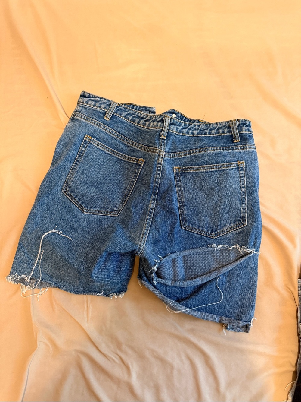 PrettyLittleThing Distressed Blue Denim Cutoff Shorts